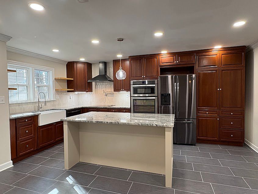 Beautiful, all new gourmet kitchen with granite countertops and island featuring seating!