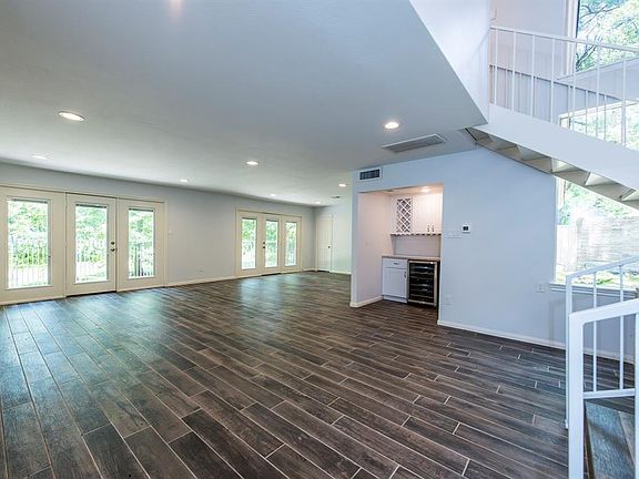 Large open living area with bar area