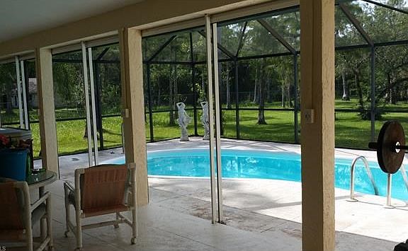 CAGED SWIMMING POOL