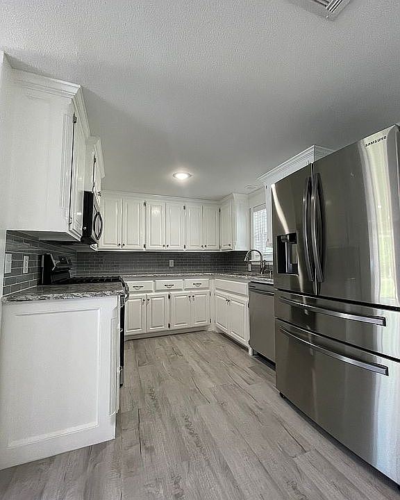 1st image of 708 NW White St