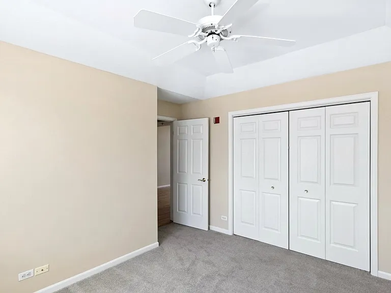 Entry to Bedroom. Trayed Ceiling. Ceiling Fan. Closet.