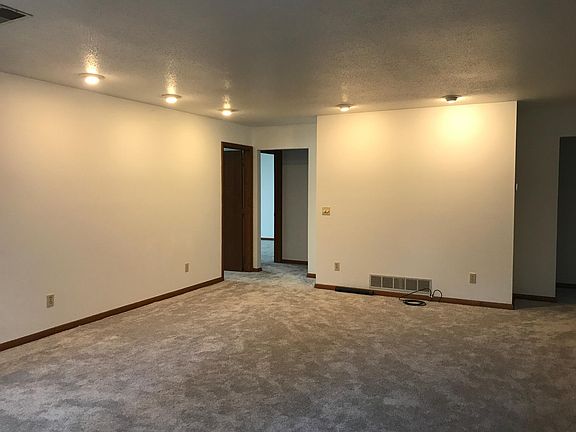 Living room with recessed lighting with dimmers