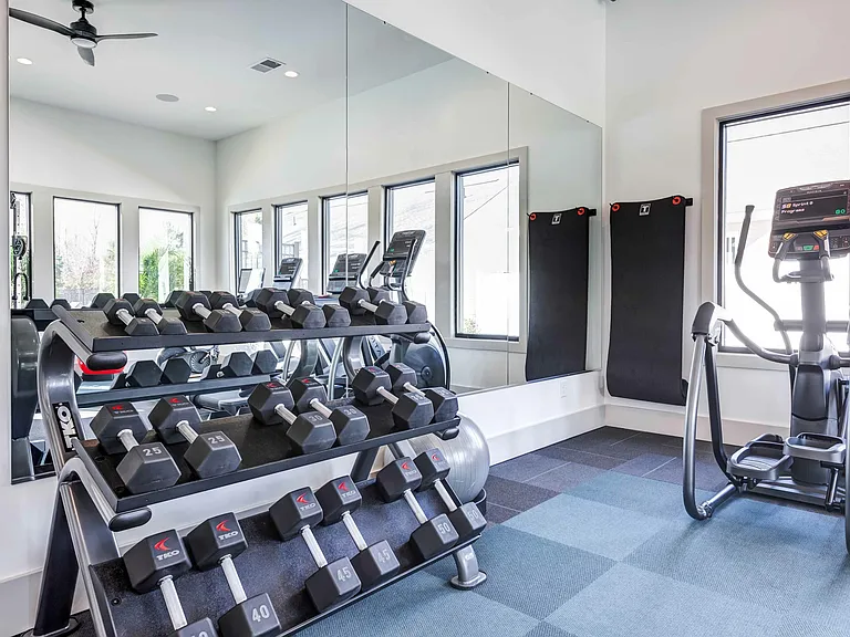 Experience convenience with Sherrills Ford's on-site gym featuring a range of dumbbells. Elevate your workout routine without leaving the comfort of your community. Your fitness journey begins at home.