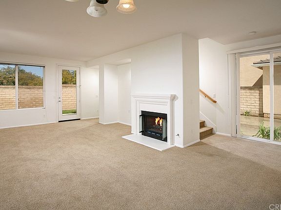 The expansive living/family room is bathed in natu