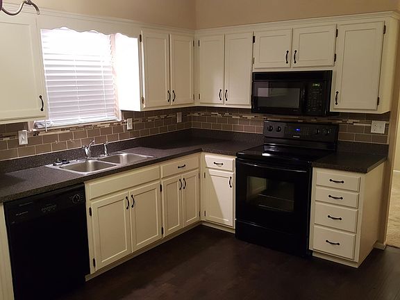 Kitchen with updated tile backsplash