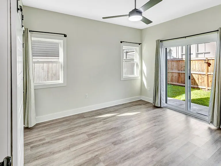 First Floor Primary Bedroom with Patio access