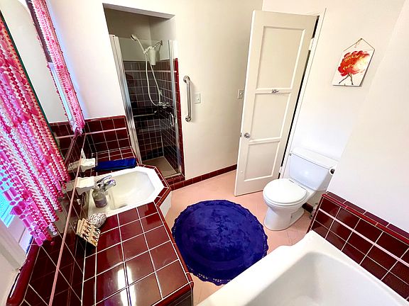 Primary bathroom with separate full size tub and shower