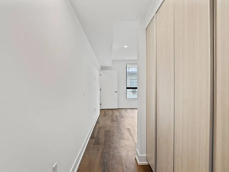 Hallway with Built-In Cabinet Storage