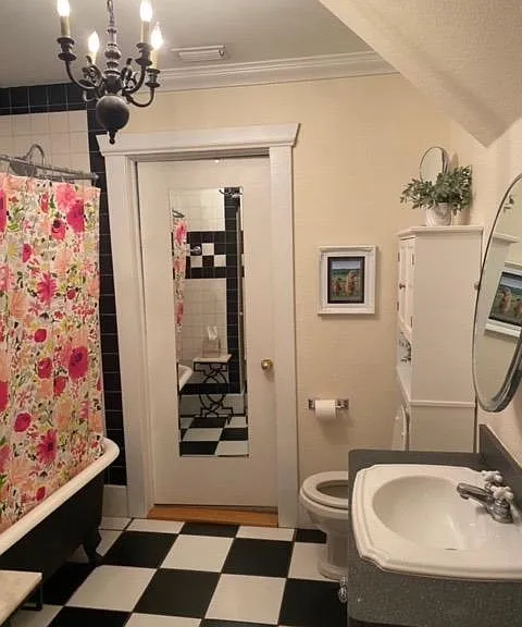 Full bathroom with claw tub