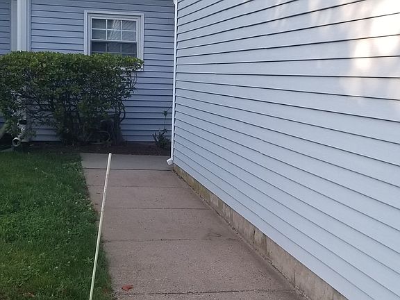 Walkway from garage to condo