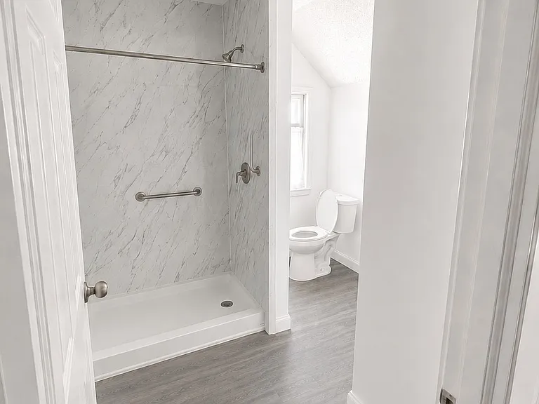 Bathroom 
(AI GENERATED PHOTO OF ILLUSTRATION OF WHAT IT WILL LOOK LIKE AFTER RENOVATIONS) 
Will upload actual pictures once renovations are completed