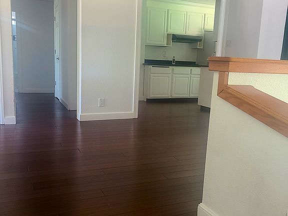 Step up living room to formal dining area
