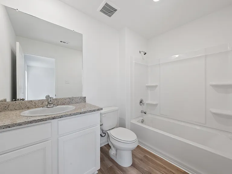 Master bathroom with a shower/tub combination.