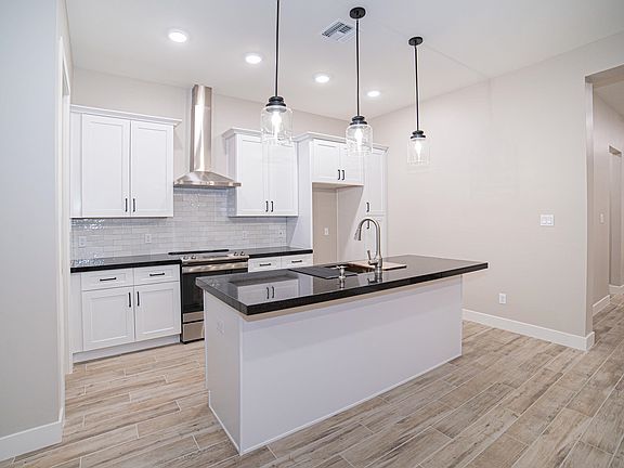 4th image of 12684 E 51st St