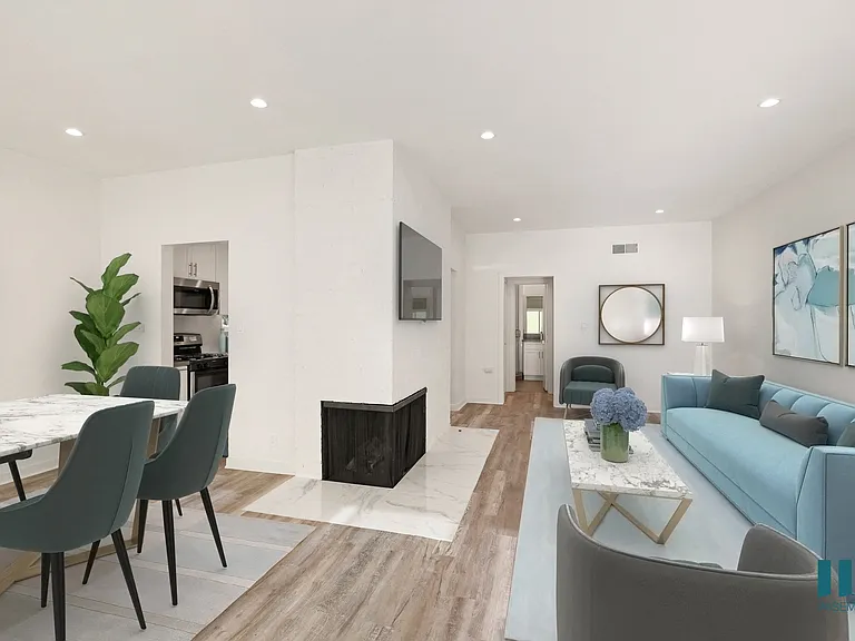 Dining and Living Room with Electric Fireplace, Vinyl Flooring, and Recessed Lighting