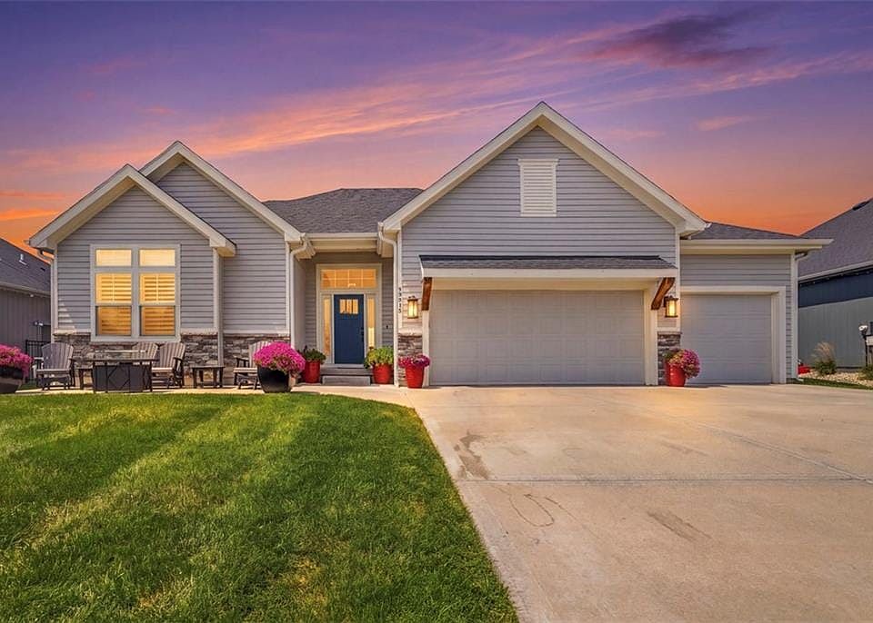 Vinyl siding exterior with stone accents