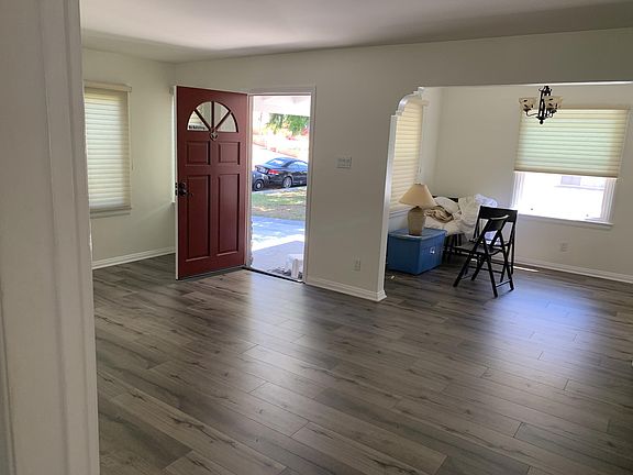 Front door entrance into living room and dining room