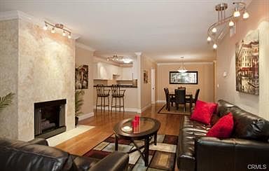 Beautiful Hardwood Flooring And Travertine Tile Fireplace ac