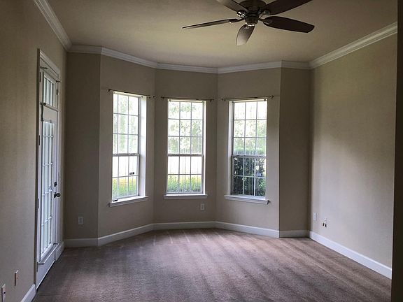 Master bedroom with access to screened porch
