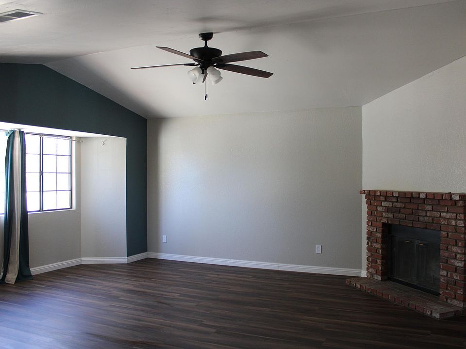 Large open living room with cozy fireplace