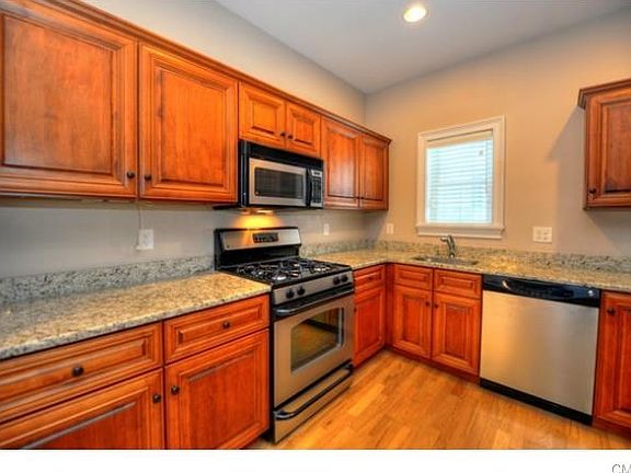 Eat-in Kitchen w/ granite counter tops and stainless steel appliances