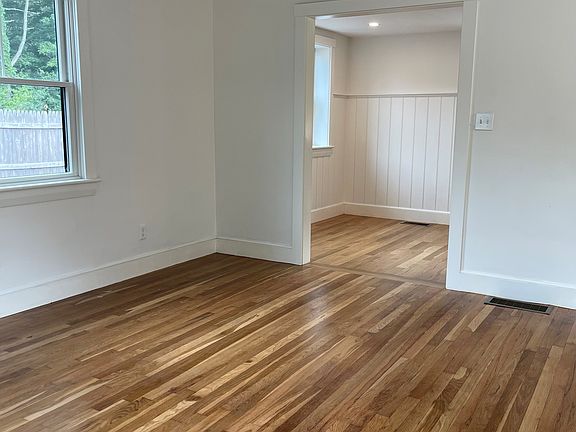 Living room looking into kitchen area