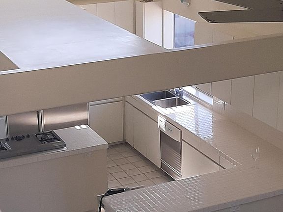 From upstairs looking down to kitchen