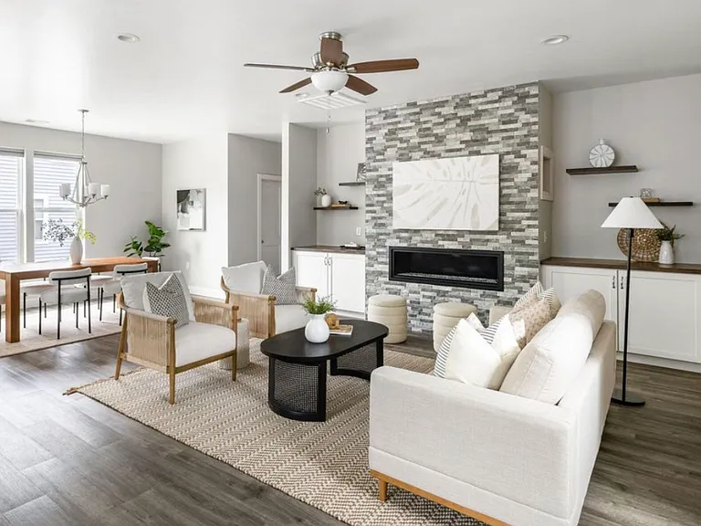 Living room with gas fireplace and custom storage and shelving