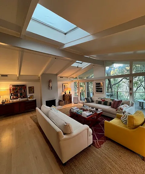 Living room with operating wood fireplace
