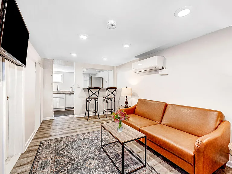Large Living Room with recessed lighting in unfurnished roomy 1 bedroom!