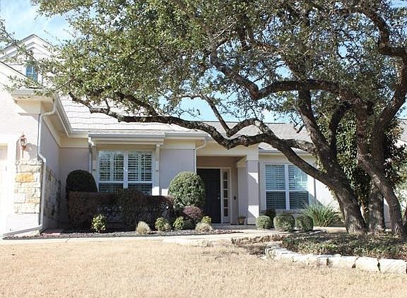 Recently groomed trees, well tended landscaping, & rock border flower beds all ensure a beautiful appearance, as well as move-in readiness.