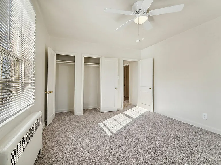 Experience comfort in this bright, contemporary bedroom with ample closet space.