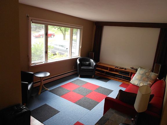 Main floor living room w/projection TV