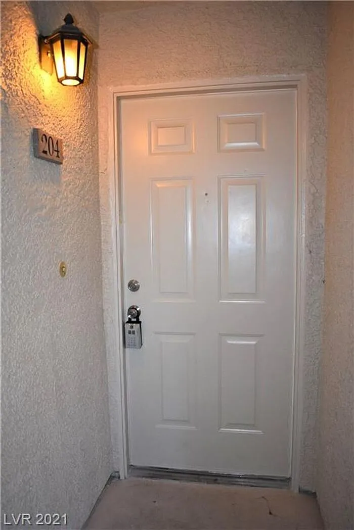 Building Photo - 7143 S Durango Dr #204