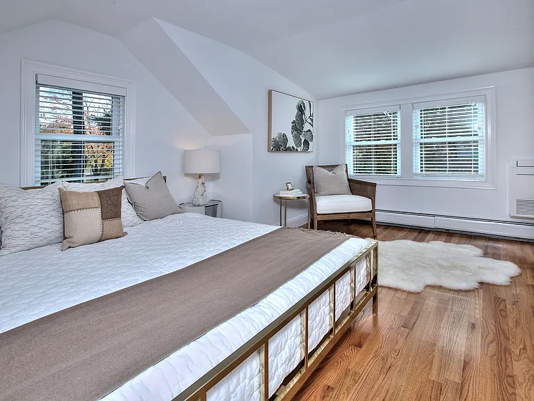 One of two primary bedrooms