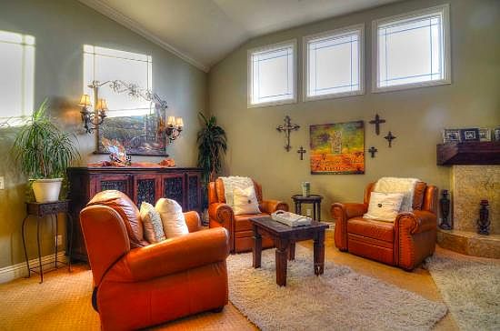 Formal front sitting room with vaulted ceilings