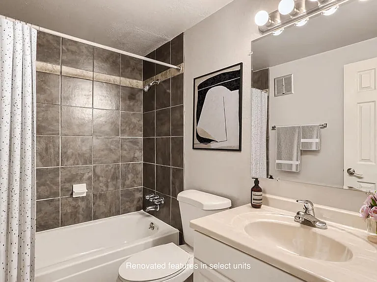 Elegant Bathroom with Ceramic Tile Backdrop