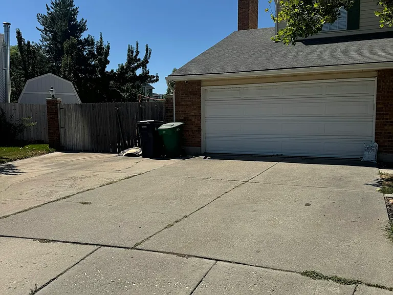 2 car garage with extra parking on the side