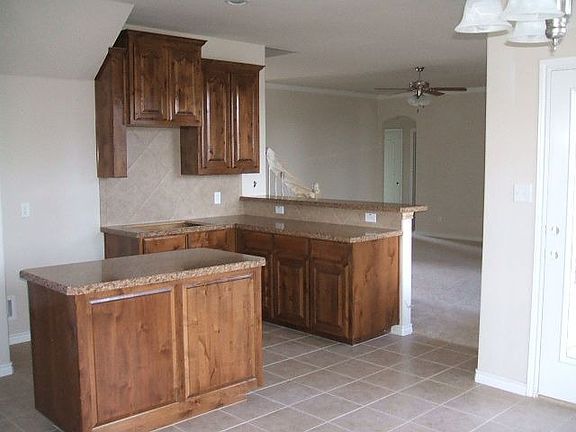 Cooks Island and Whirlpool appliances are included