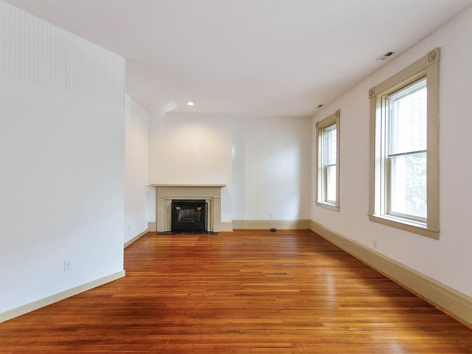 Living room with wood burning fireplace