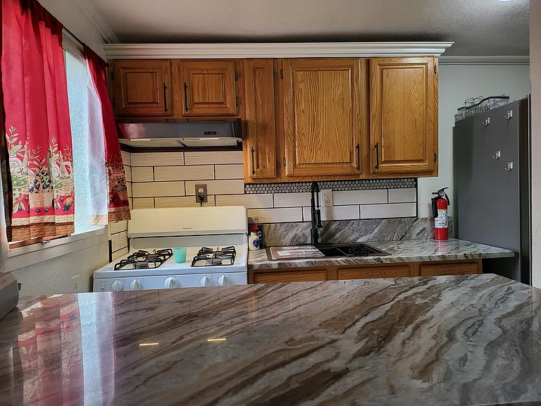 Artistically Beautiful marble counter top with breakfast nook
