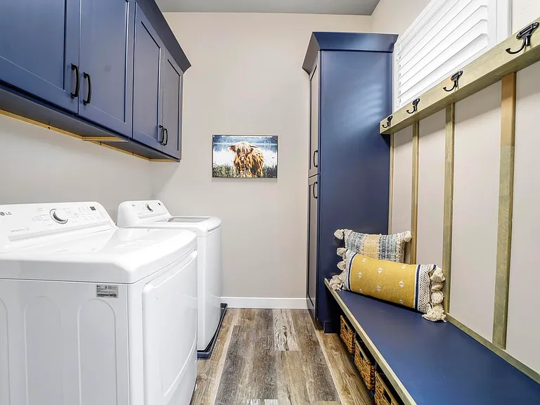 Laundry Room & Mudroom Area. This Is On Main Level. Like New Washer & Dryer, Storage Cabinets, Mudroom Area With Baskets For Shoes & Winter Clothing