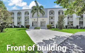 Front of the building ground floor unit with huge patio overlooking the water