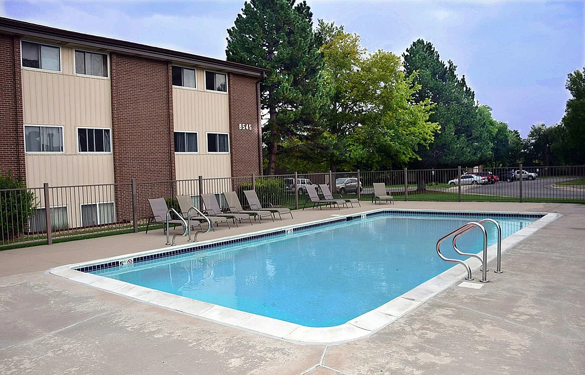Relax by the sparkling pool in our residential community, perfect for leisure and enjoyment. - 8555 W Dakota Ave