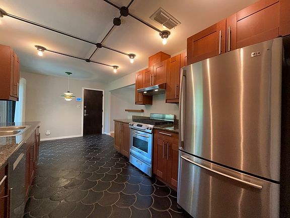 Bright kitchen! Beautiful floors. Gas stove