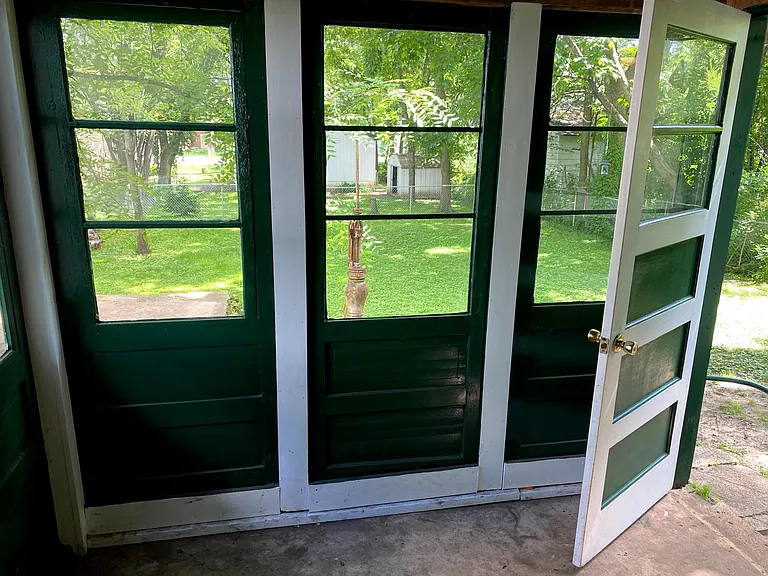 Backyard porch/mudroom.