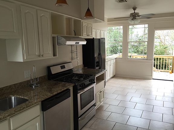 Kitchen with door to deck (27' X 10')
