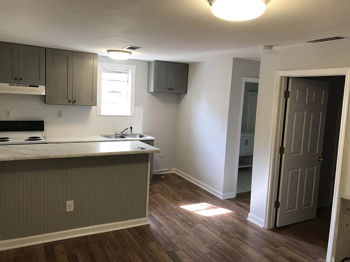 Open kitchen. (Refrigerator included but not shown in the photo.) - 1706 Abercorn St #A