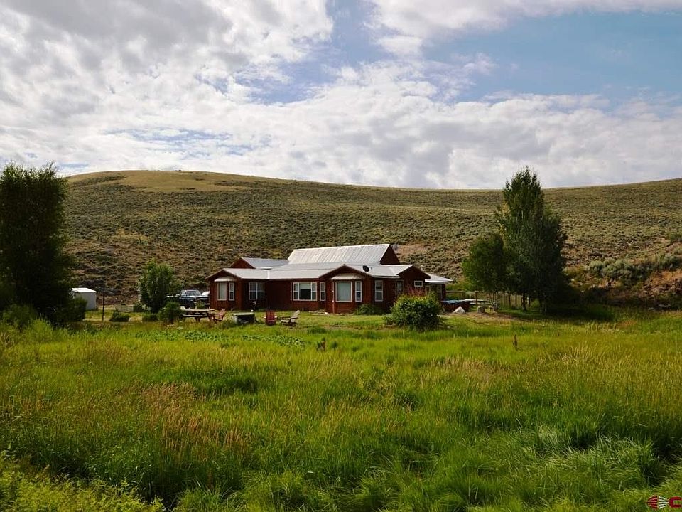 35 acre parcel, borders BLM, Tomichi Creek flows through the property.  Water rights.