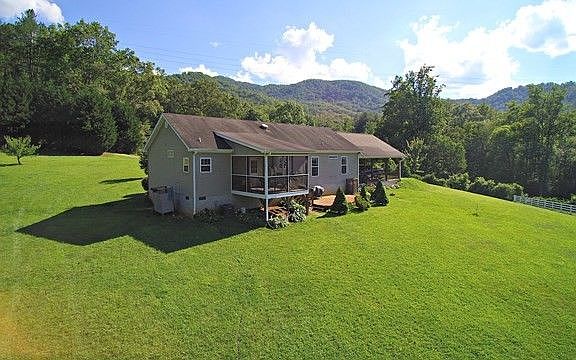 Rear view of home & carport